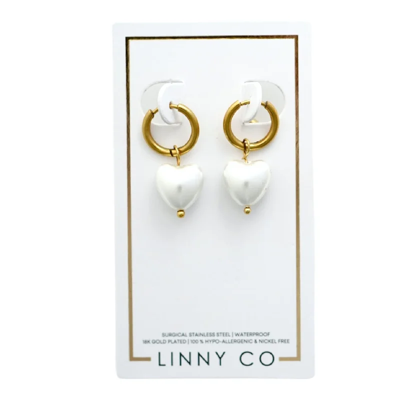 Modern Silver Earrings-Linny Co | Willa Gold Tone Huggie Hoops with Dangling Heart Pearls