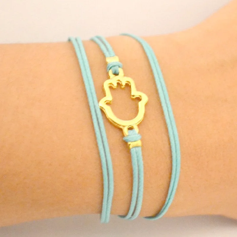 Women’s Designer Bracelet-Gold plated wrapped Hamsa bracelet, turquoise cord, evil eye protection